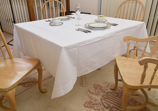 Festive 90" square tablecloth. White. Hemstitch